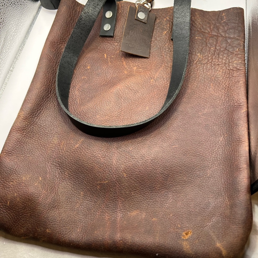 Classic Brown Leather Satchel with Black Handles